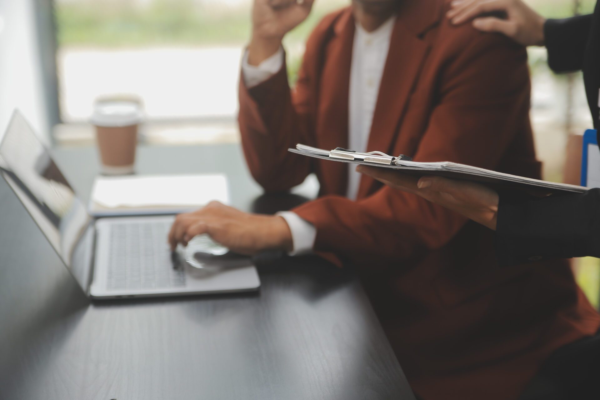 Financial analysts analyze business financial reports on a digi Financial analysts analyze business financial reports on a digi
